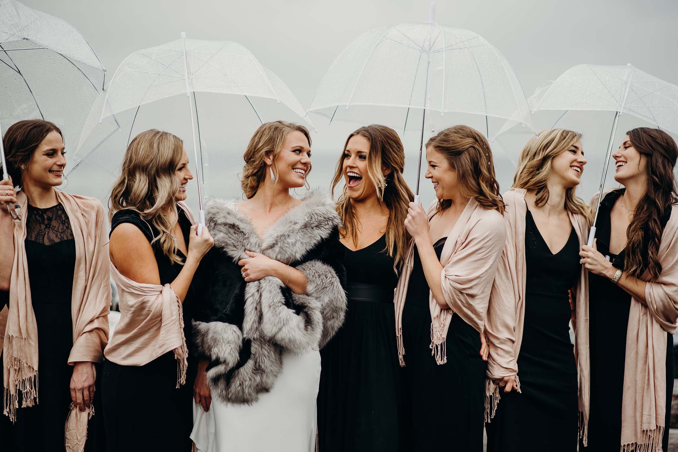 bride and bridesmaids in the seattle rain