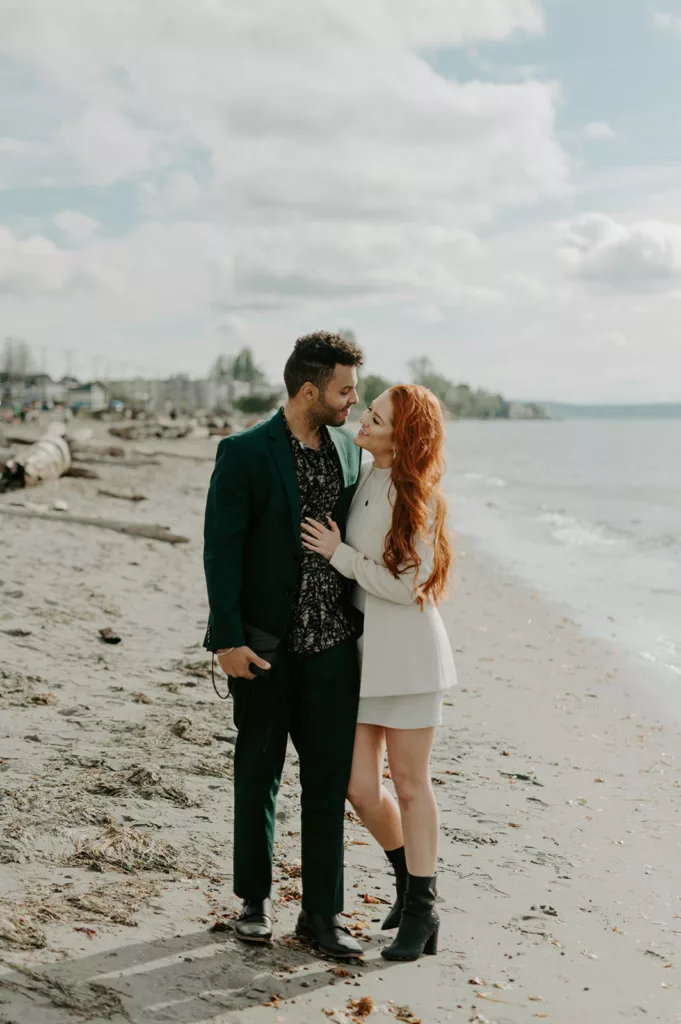 romantic wedding couple posing like a kiss on the beach