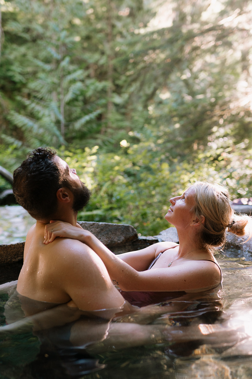 R and M enjoying the view while relaxing in a hot spring.