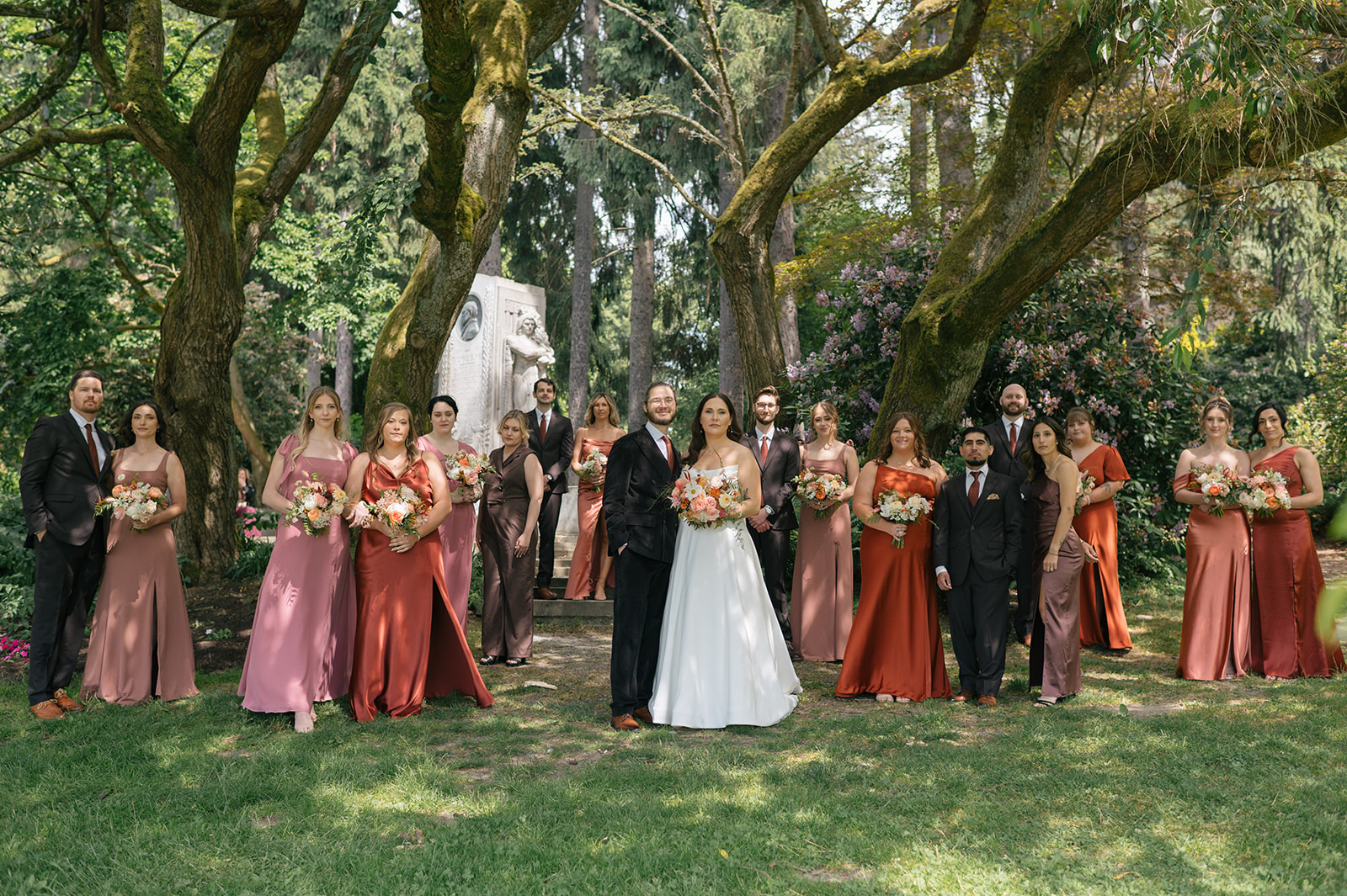 Wedding party gathered for portraits at Volunteer Park in Seattle