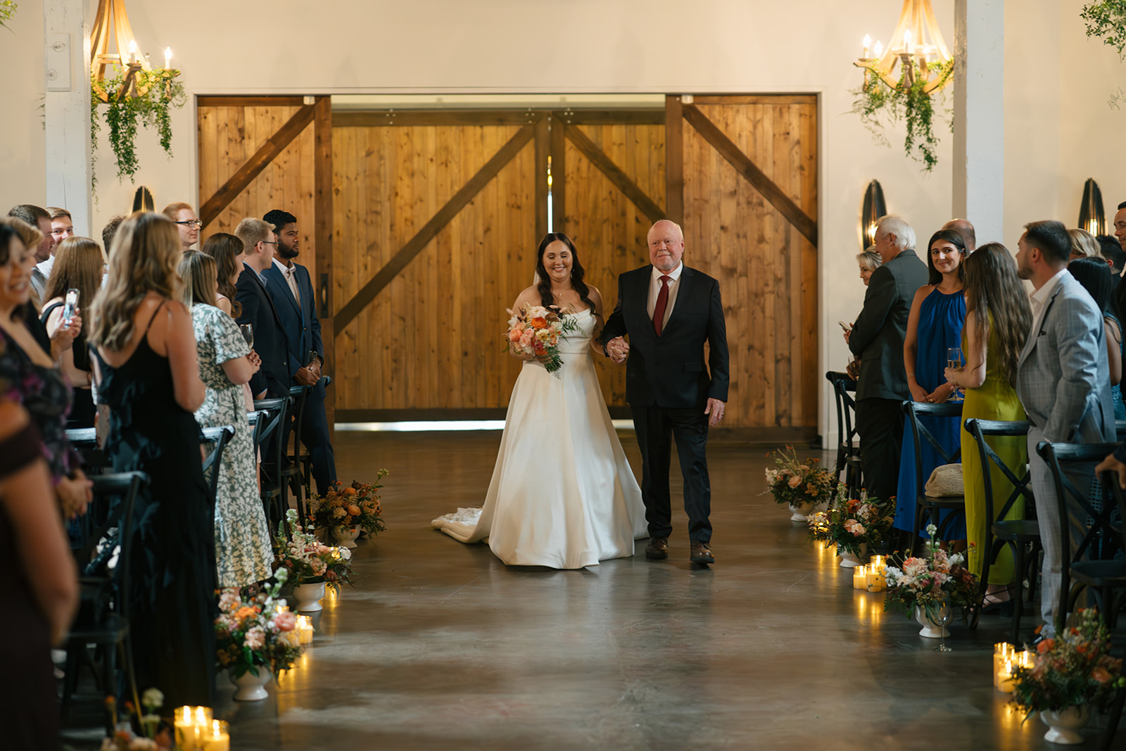 Bride walking down the aisle during Hideaway Cellars ceremony