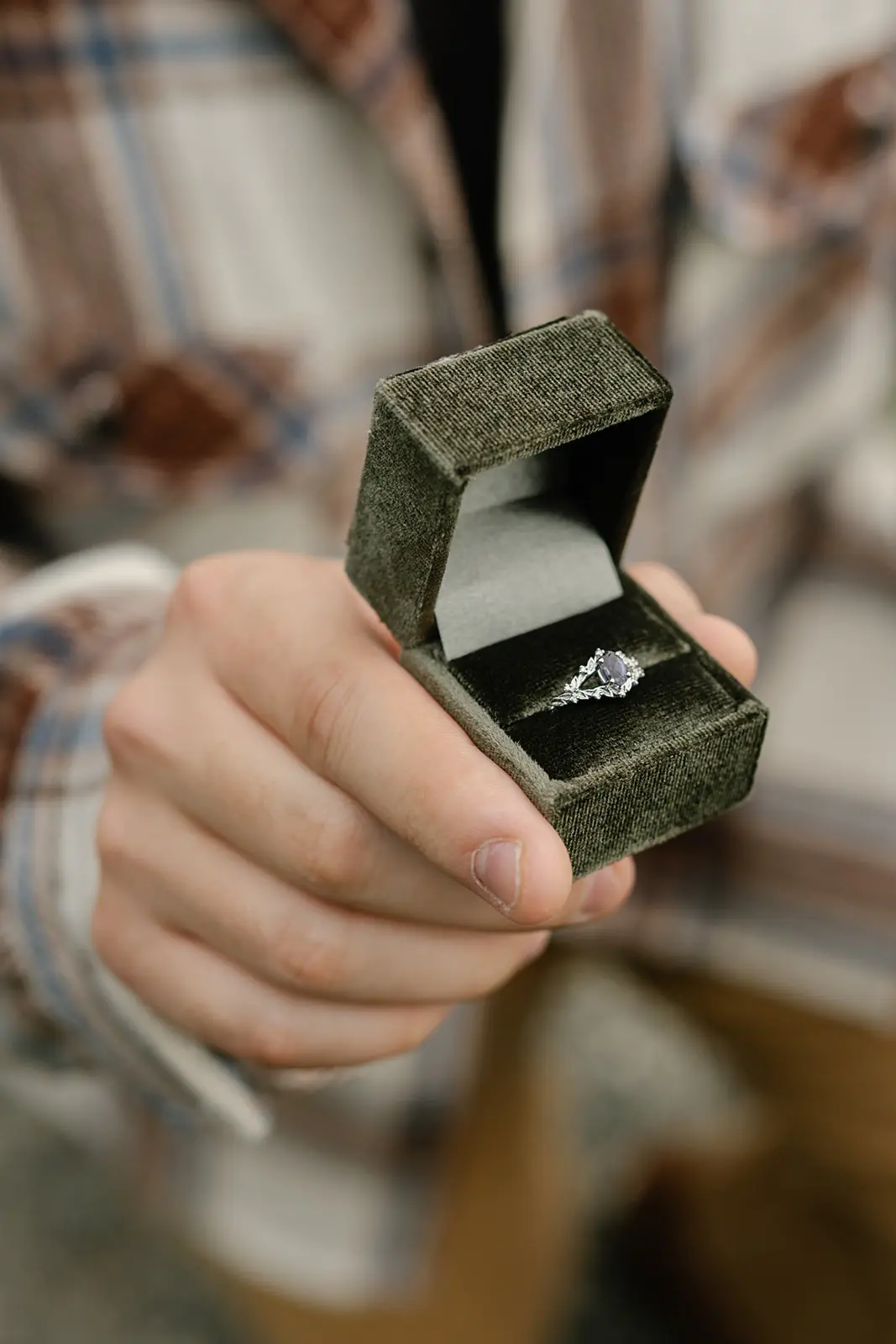 Close-up of Ashley’s engagement ring inside its velvet box during the proposal.