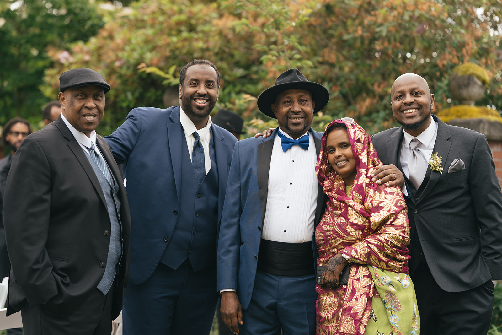 Family members smiling together outdoors at Lairmont Manor wedding