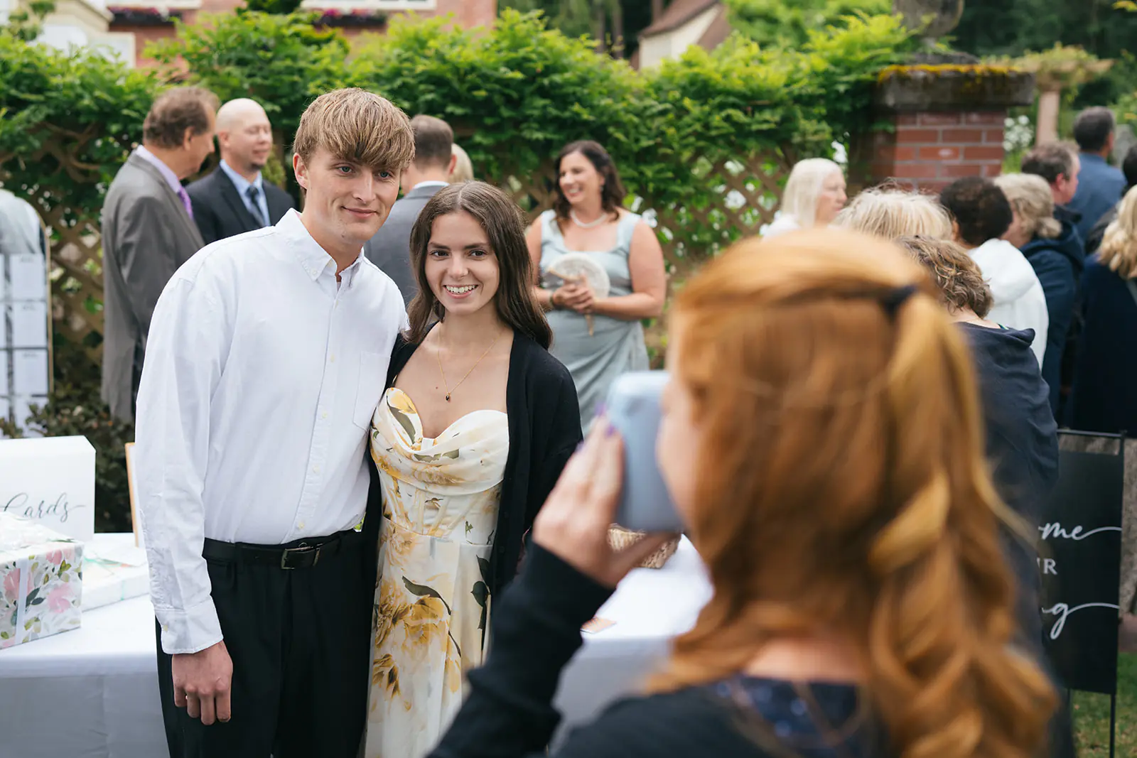Wedding guests posing for a photo during outdoor celebration at Lairmont Manor