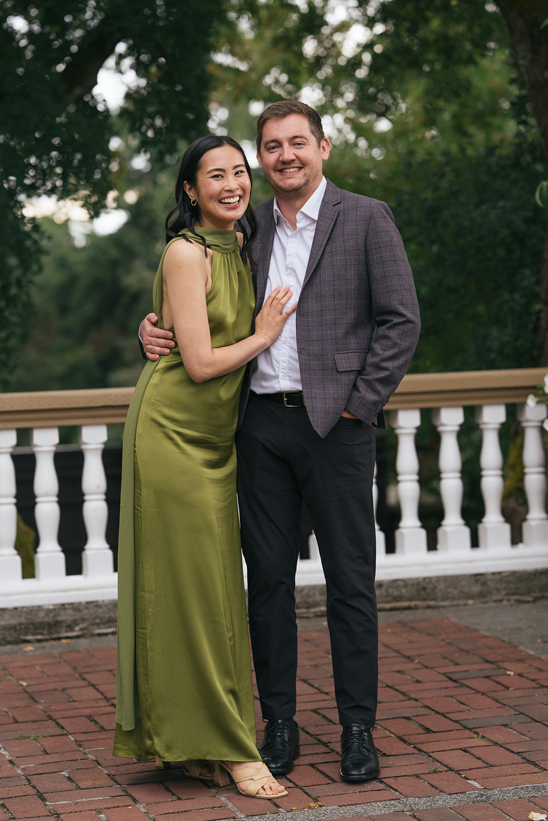 Wedding guests posing together on a garden terrace at Lairmont Manor