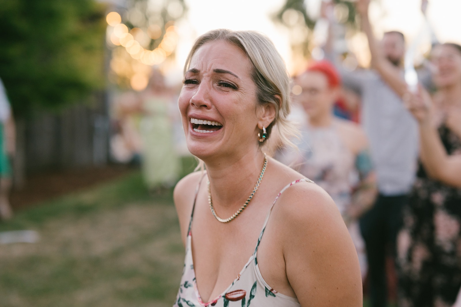 The bride's sister cries tears of joy as this Saltbox Barn wedding celebration unfolds