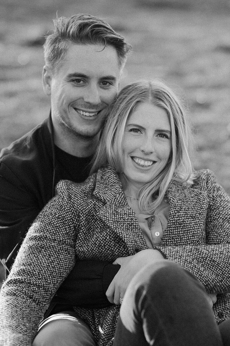 Black and white portrait of a smiling couple during their Gas Works Park engagement session