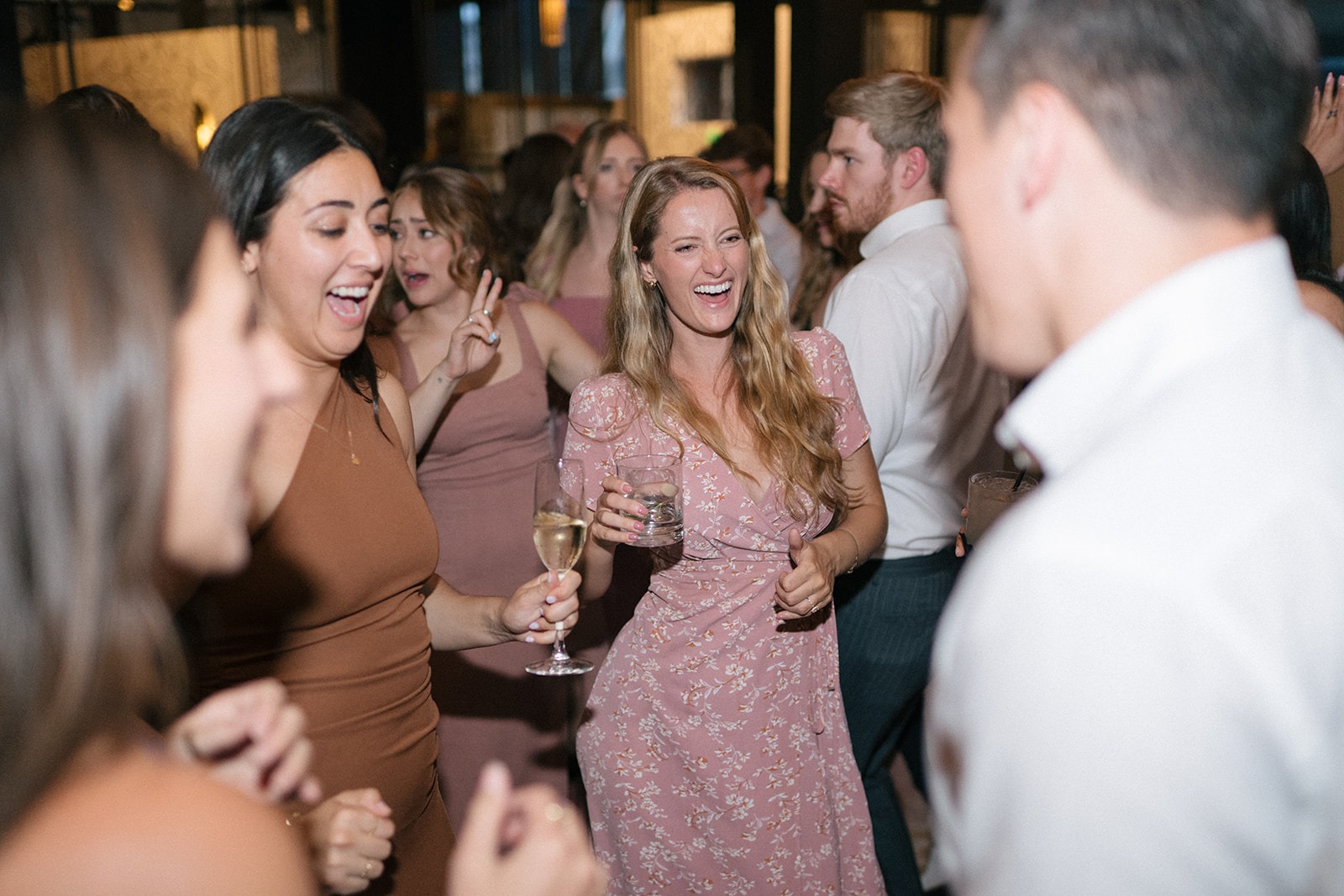 Guests celebrating on the dance floor during Hideaway Cellars wedding