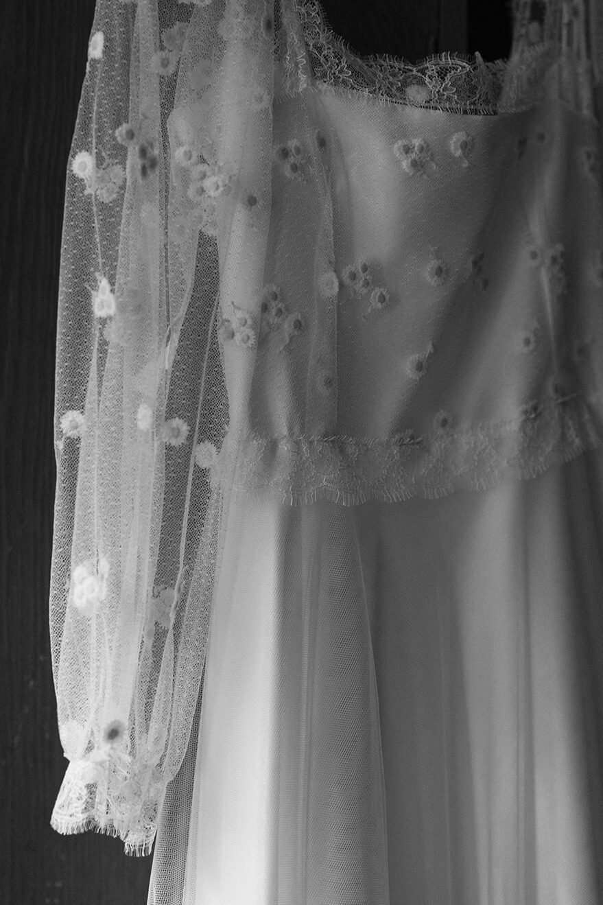 Close-up of lace wedding dress fabric and veil