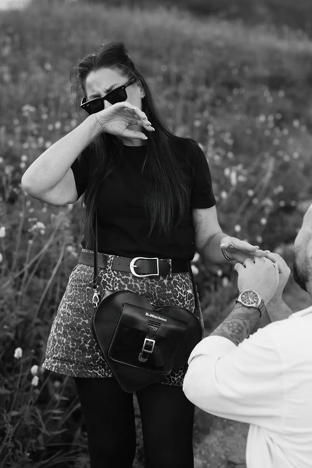 Bride-to-be wipes tears of joy after her surprise Mount Rainier proposal at Paradise

