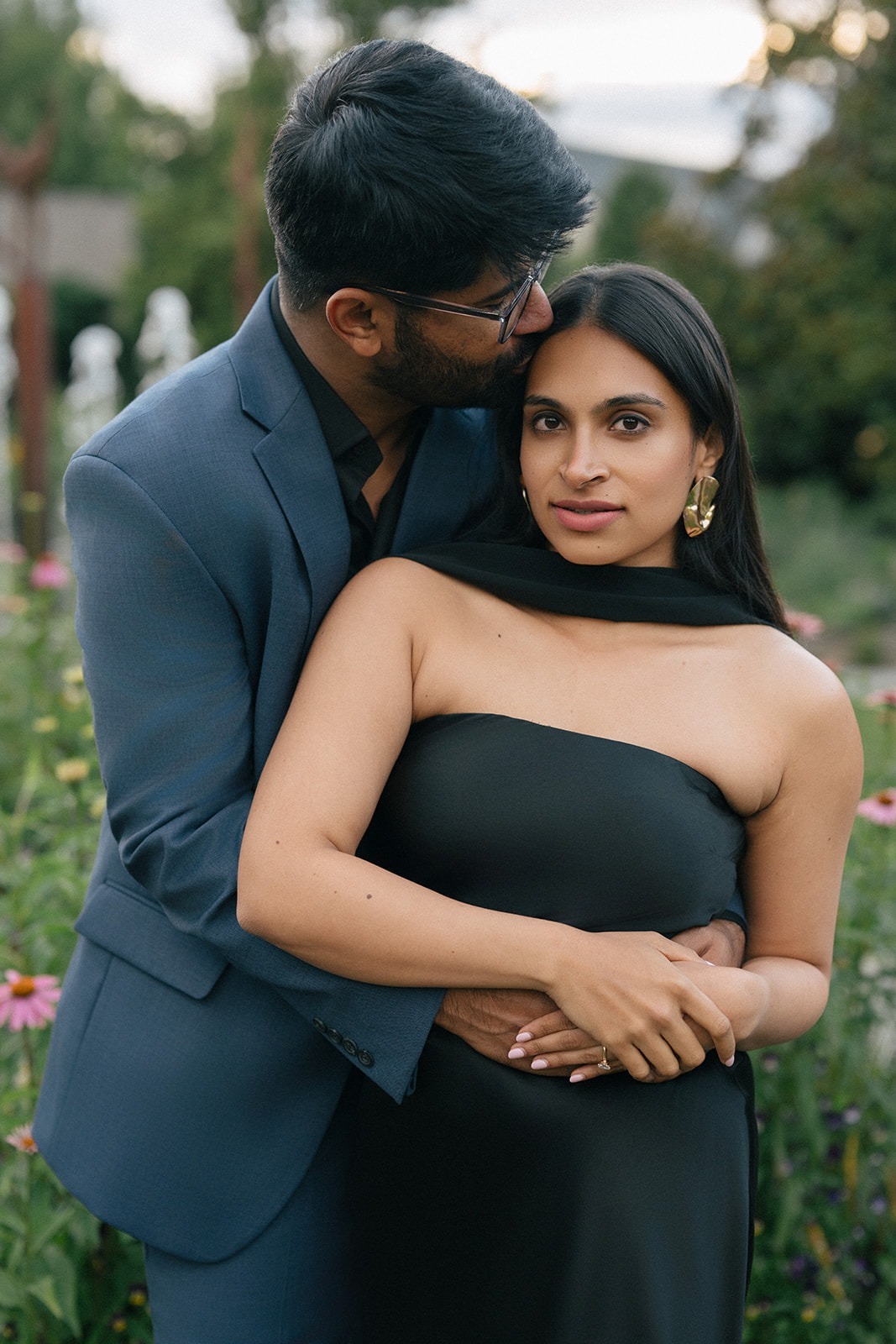 Piyush kisses Priyanka on the temple during their Willows Lodge engagement portrait session in Woodinville