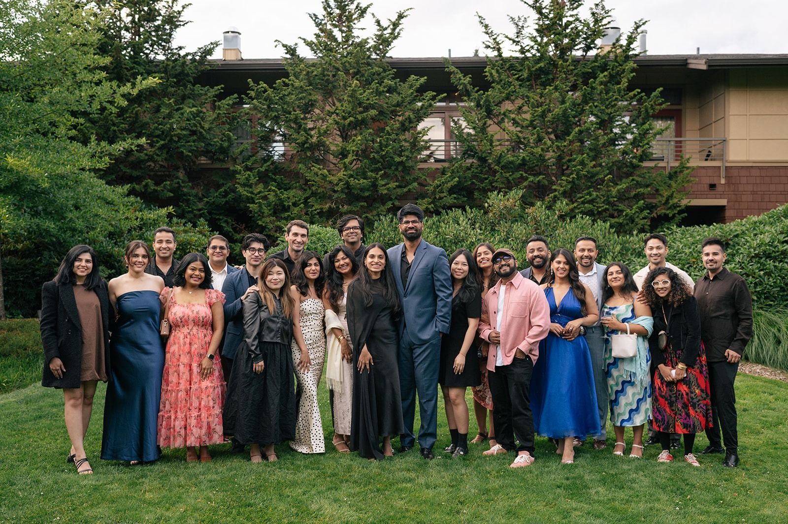 Large group portrait of Piyush and Priyanka with their friends and family celebrating the surprise engagement at Willows Lodge